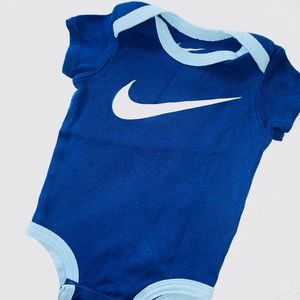 Nike baby boy onesie.